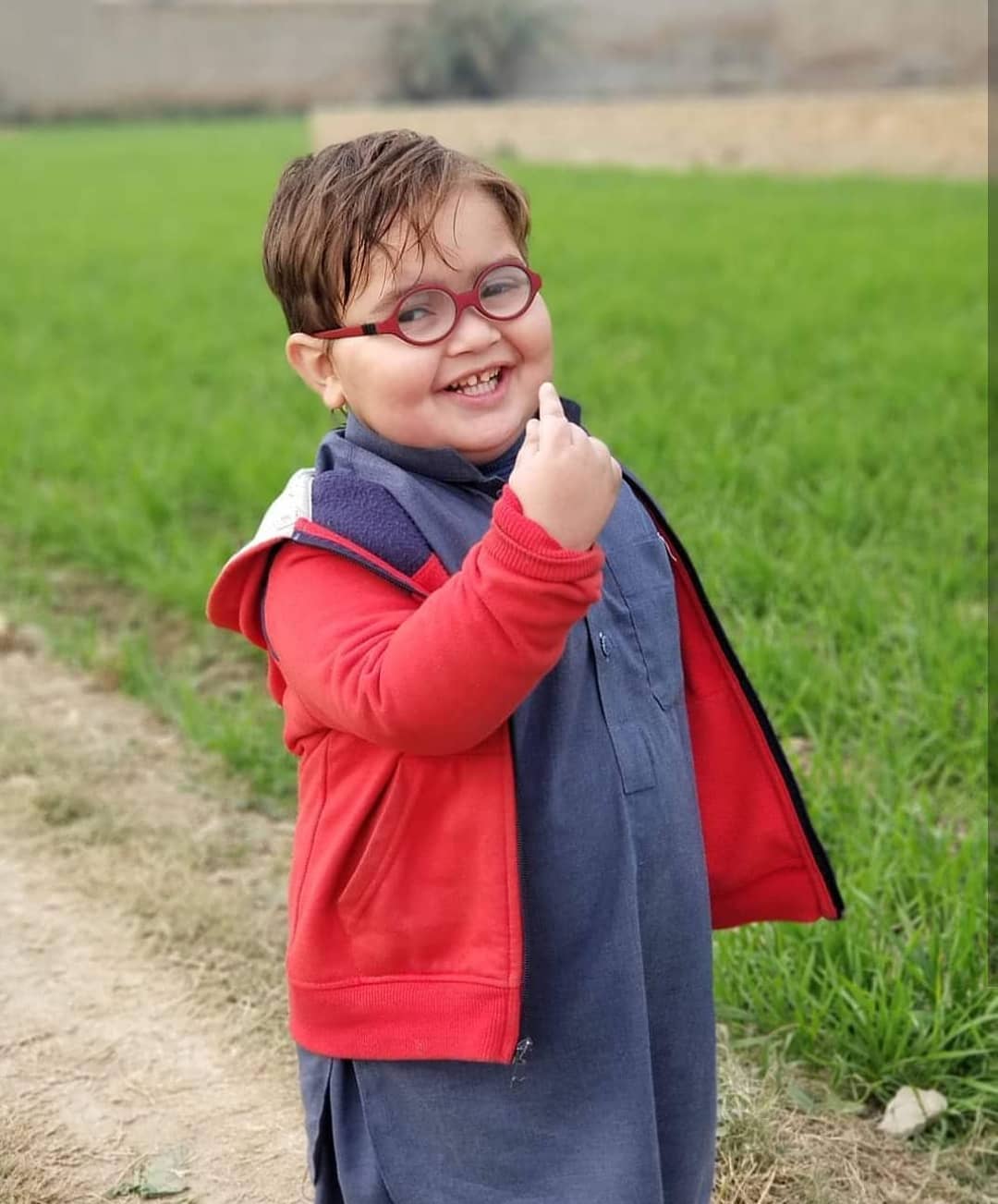 Ahmad Shah Cute Kid HD Photos In Red Jacket