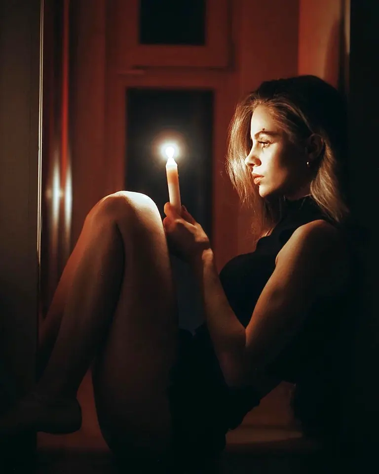 Holding a candle