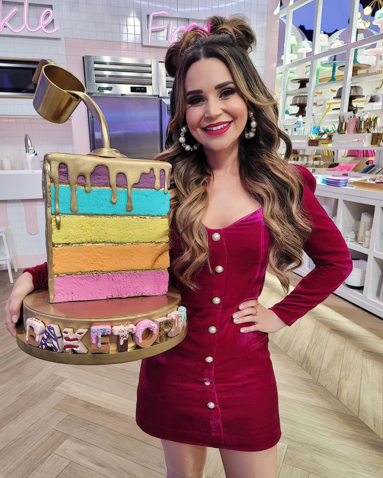 Rosanna Pansino posing with one of her cakes